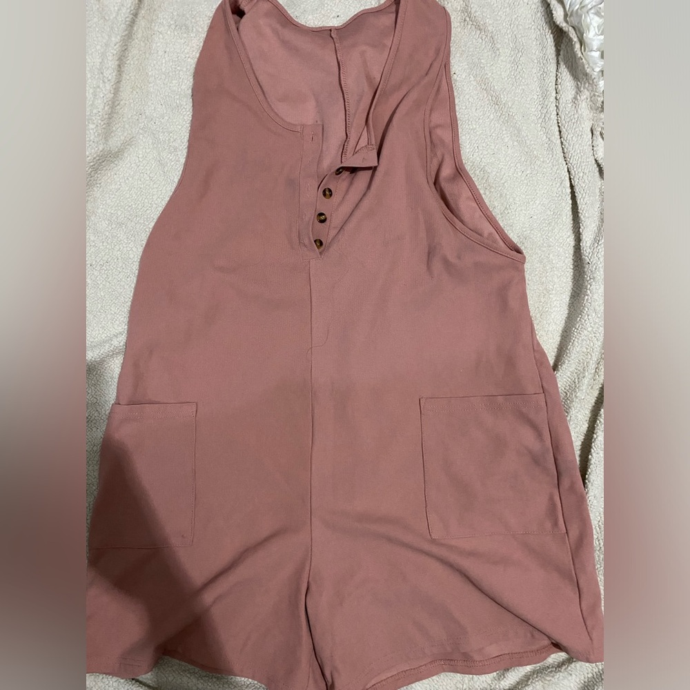 Pink Romper with button v line neck no stains barely worn